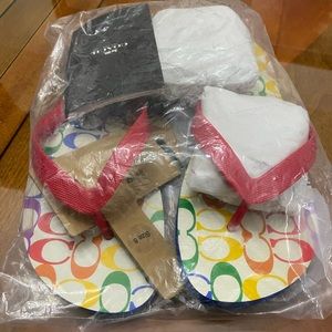 Coach women’s Flip Flop Pride Colors never worn still in original bag. Size 8